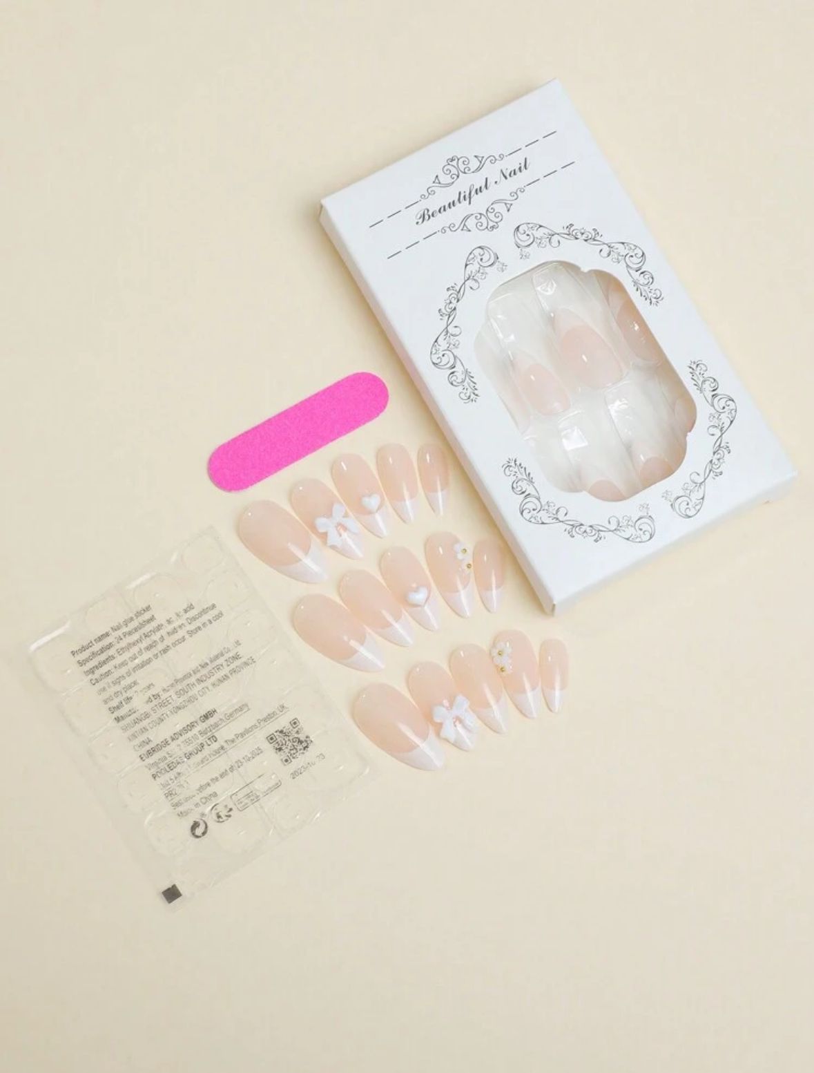 Uñas press On moño